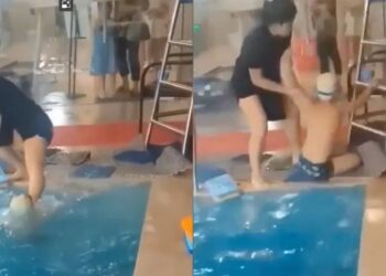 Badjuf onder vuur na schokkende actie: bang kind met trap het water in geduwd