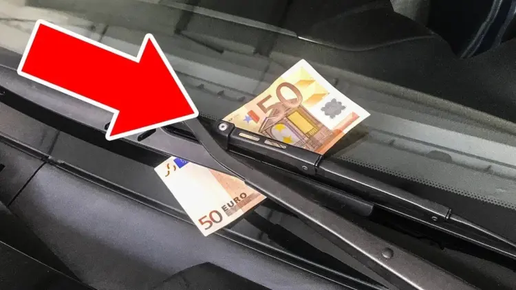 LET OP: pak nooit het briefgeld dat onder je ruitenwisser ligt!